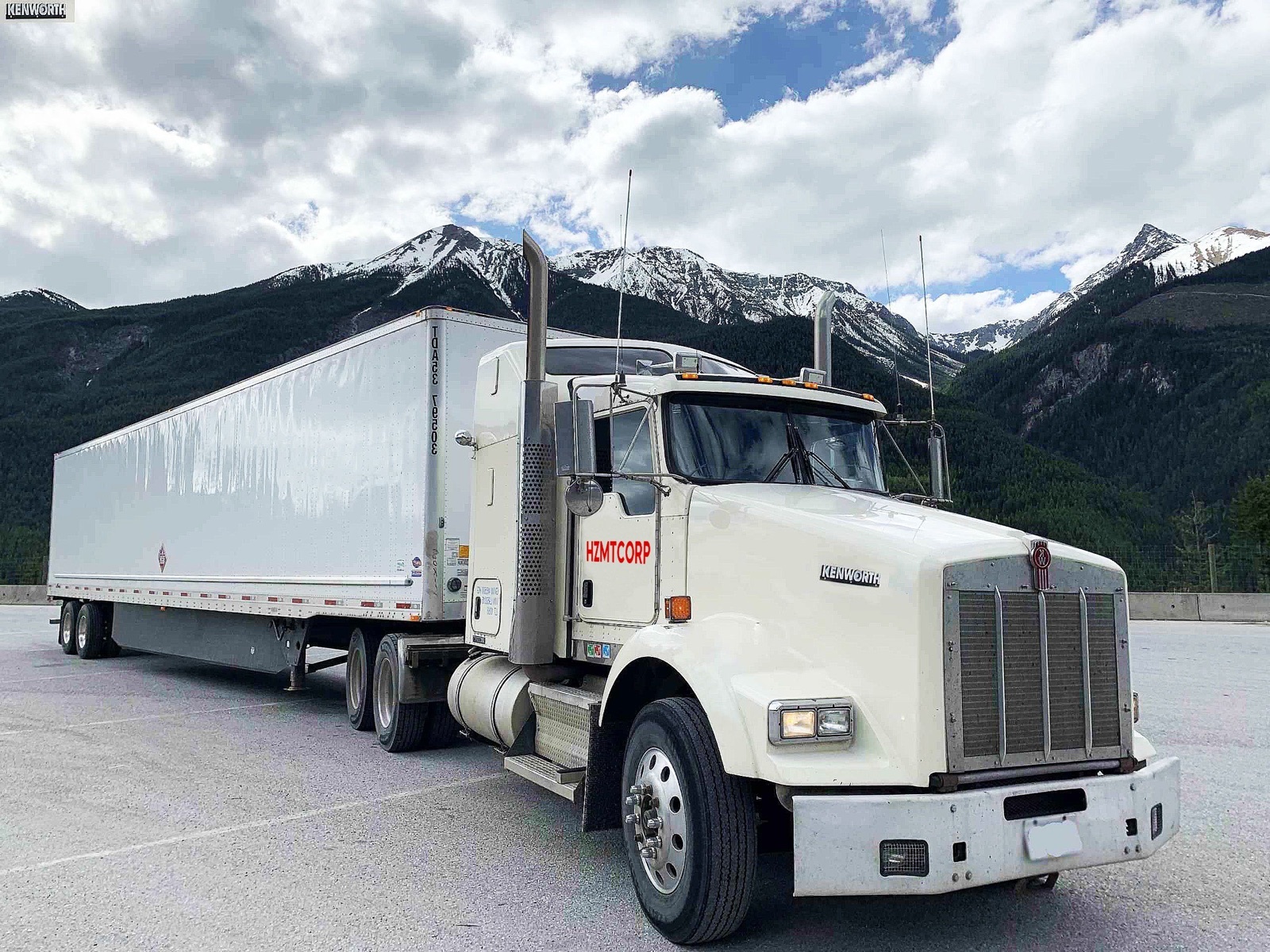 HZMTCORP truck with mountain background